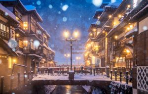 Japansk onsenby på kvällen med snö som faller